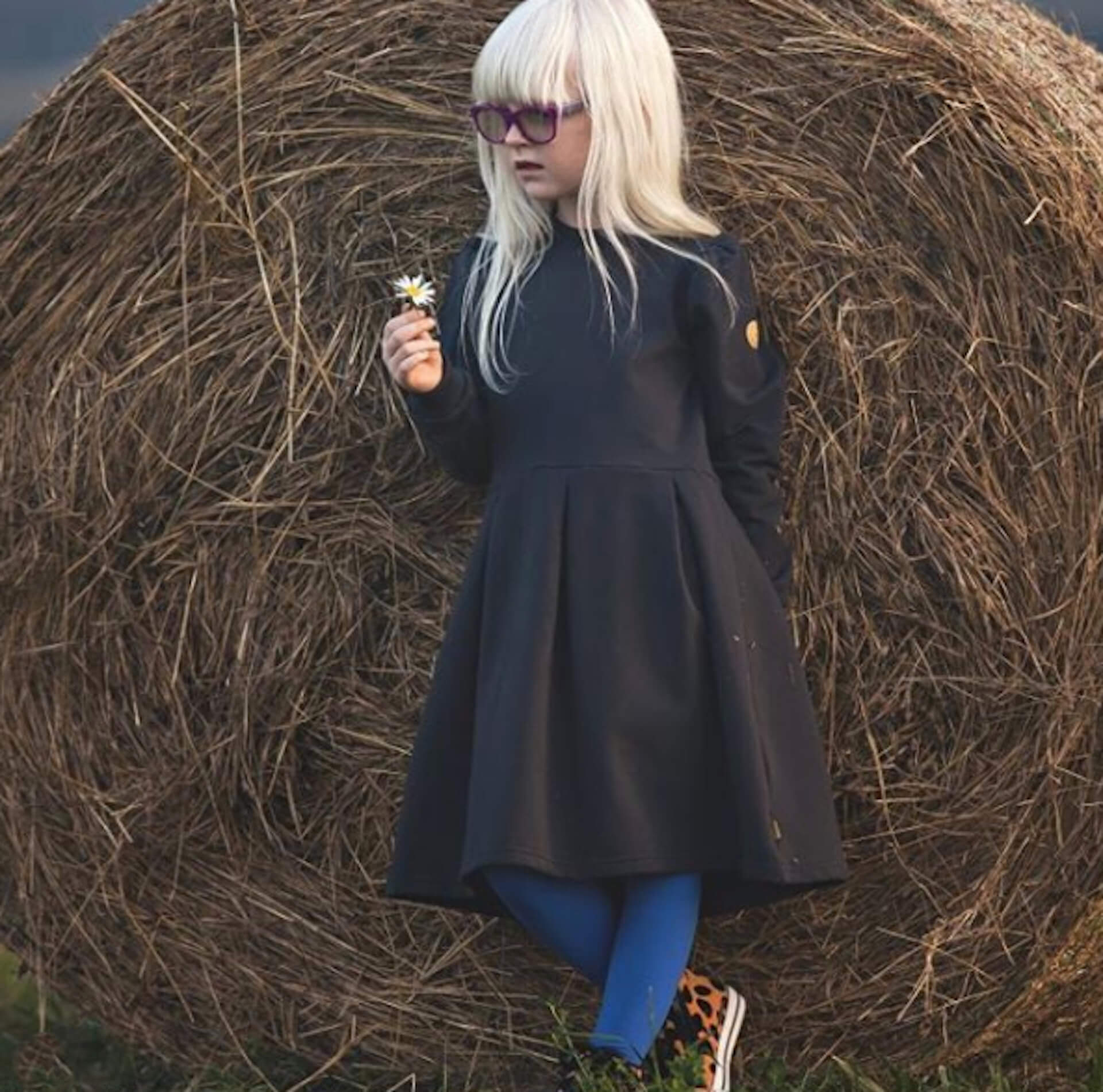 Children's wear look book page with a printed tee and shorts