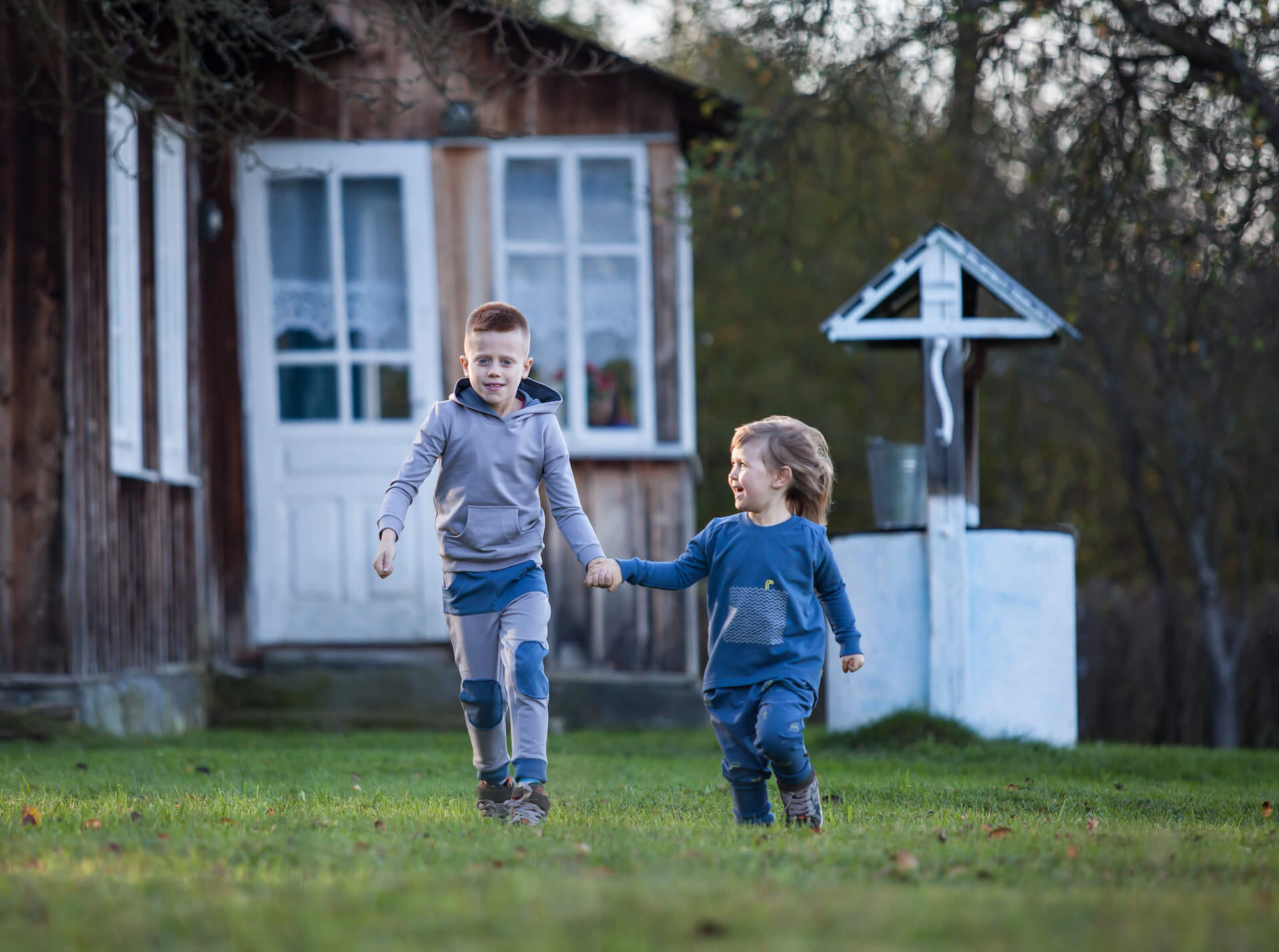 Children's wear range laid out across a full spread