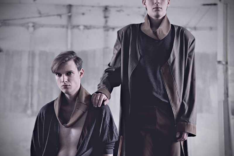 Two models in layered charcoal and tobacco tailoring